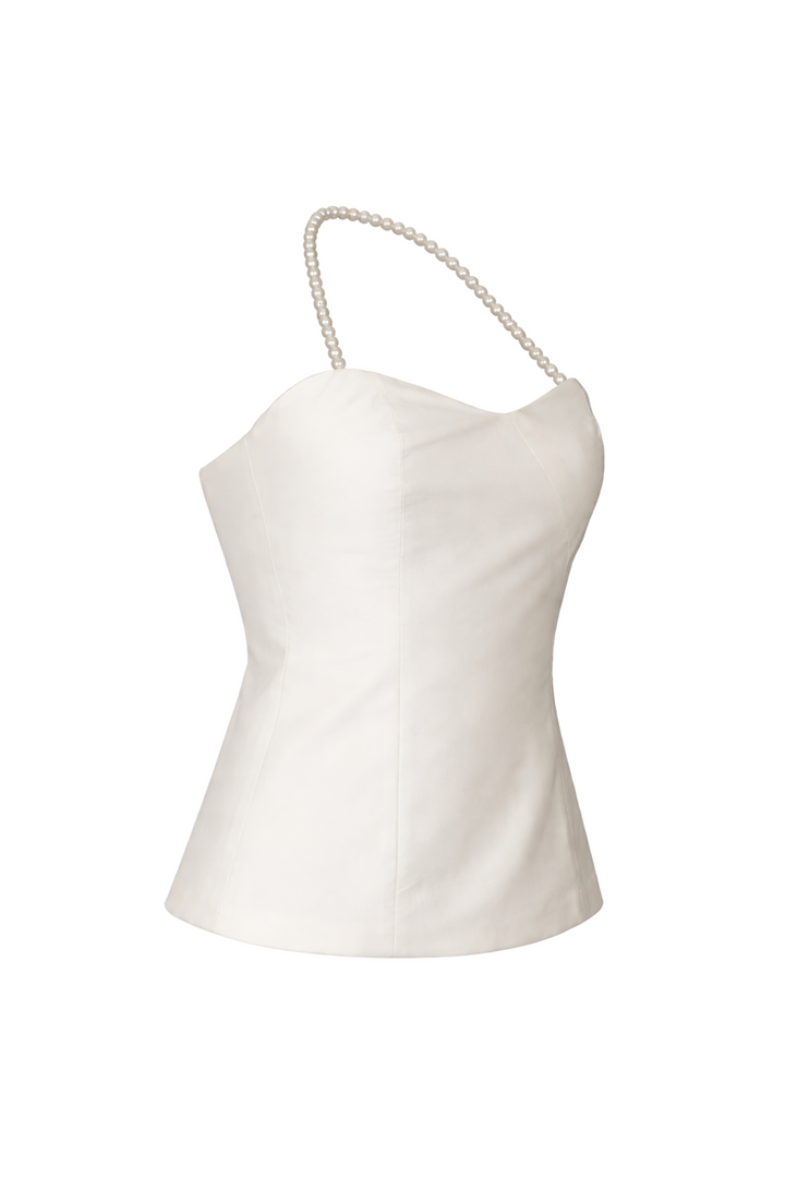 White halter top with pearl straps on a white background